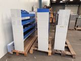 several metal shelvings are stacked on pallets in a warehouse