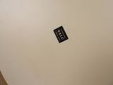 a sticker that is on the wall of a bathroom