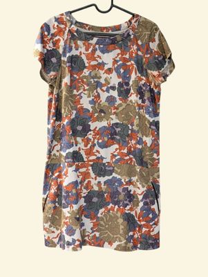 an image of a women ' s top with flowers on it