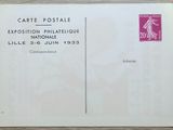 an envelope with a picture of a woman on it sitting on a table