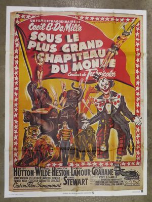 a poster advertising a circus show with clowns and circus performers