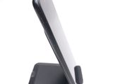 a close up of a cell phone on a stand