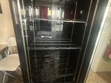 an image of a refrigerator that is in a kitchen