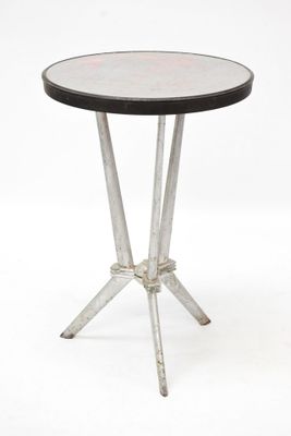 an image of a table with a black top and metal legs