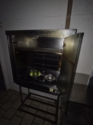 a small oven that has some food inside of it