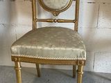 antique gold painted chair with floral upholstered seat and back