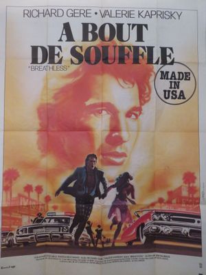 une affiche de film mettant en scène un homme et une femme marchant dans la rue