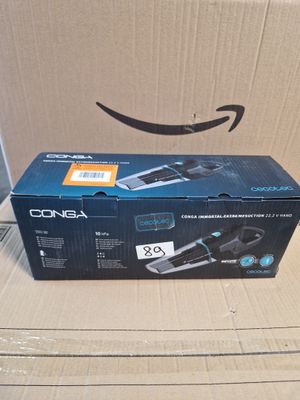 an amazon box with a remote control and a box with an amazon logo