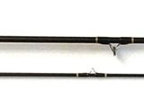 a blurry photo of two baseball bats on a table