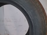 a close up of a tire tire on a white surface