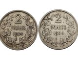 une pièce d'argent sur laquelle figurent le chiffre vingt et la date vingt