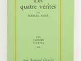 an old book with a green cover and a yellow border