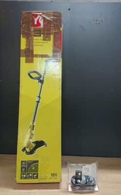 une image représentant une boîte à outils posée sur une table en bois