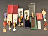 many medals and medals on display on a table