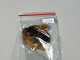 a bag of dried fish in it on a table