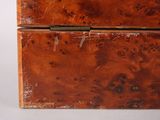 a wooden box that has a handle on it