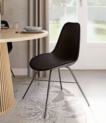 Chaise en polyuréthane, coloris noir- defaut mousse assise (…