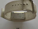 an image of a wrist watch with a silver buckle on it