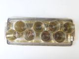 a silver tray with a bunch of cups on it
