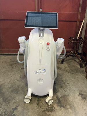 a white machine that has a solar panel on top of it