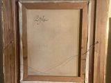 an old picture frame with a drawing of a bird on it