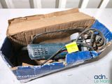 a box that has a drill in it on a table