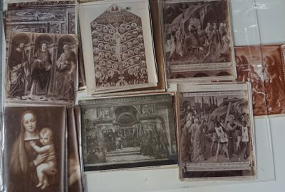 a lot of old photos on the wall of a room