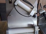 a machine that is sitting on top of a wooden table