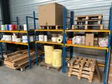 many pallets with boxes and boxes on them in a warehouse