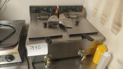 two fryers that are sitting on a table
