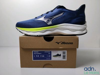 Chaussures de course Mizuno Wave Rider dans leur boîte