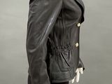 black leather jacket on mannequin mannequin with black tights and black tights