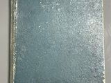 a blue book sitting on top of a table