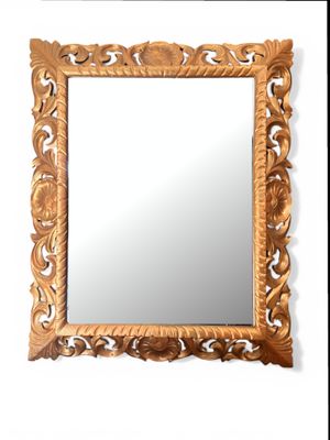 Miroir rectangulaire en bois doré à décor de rinceaux feuill…