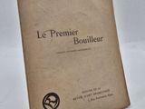 La couverture du livre *Le Premier Bouiller* est représentée sur un fond blanc.