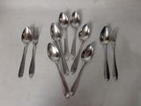 a lot of spoons and spoon spoons on the table