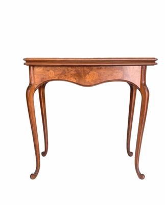 an image of a small wooden table on a white background