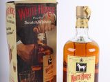 an image of a bottle of white horse scotch whisky next to a box of whisky