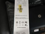 someone is holding a box that has a laptop in it