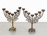 pair of antique brass candelabs with ornate design