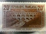 an old stamp with a picture of a train on it