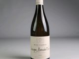 a bottle of wine that is sitting on a table