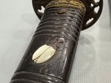 a close up of a knife on a table