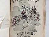 an old book with a drawing of a boy and a dog