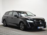 a picture of a black car parked in a garage