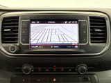 a picture of a car dashboard with a car ' s navigation system