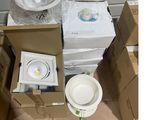 a box of boxes and a bowl of food on the floor