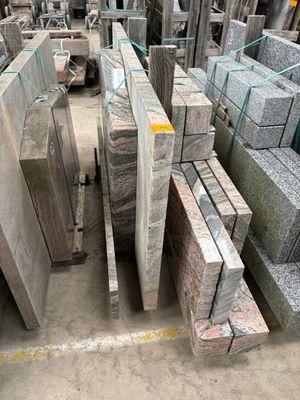 many pieces of granite stacked on top of each other