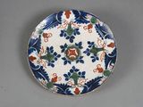 l'image d'une assiette bleue et blanche ornée de fleurs