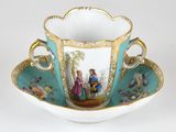 une tasse à thé et une soucoupe ornées d'une peinture